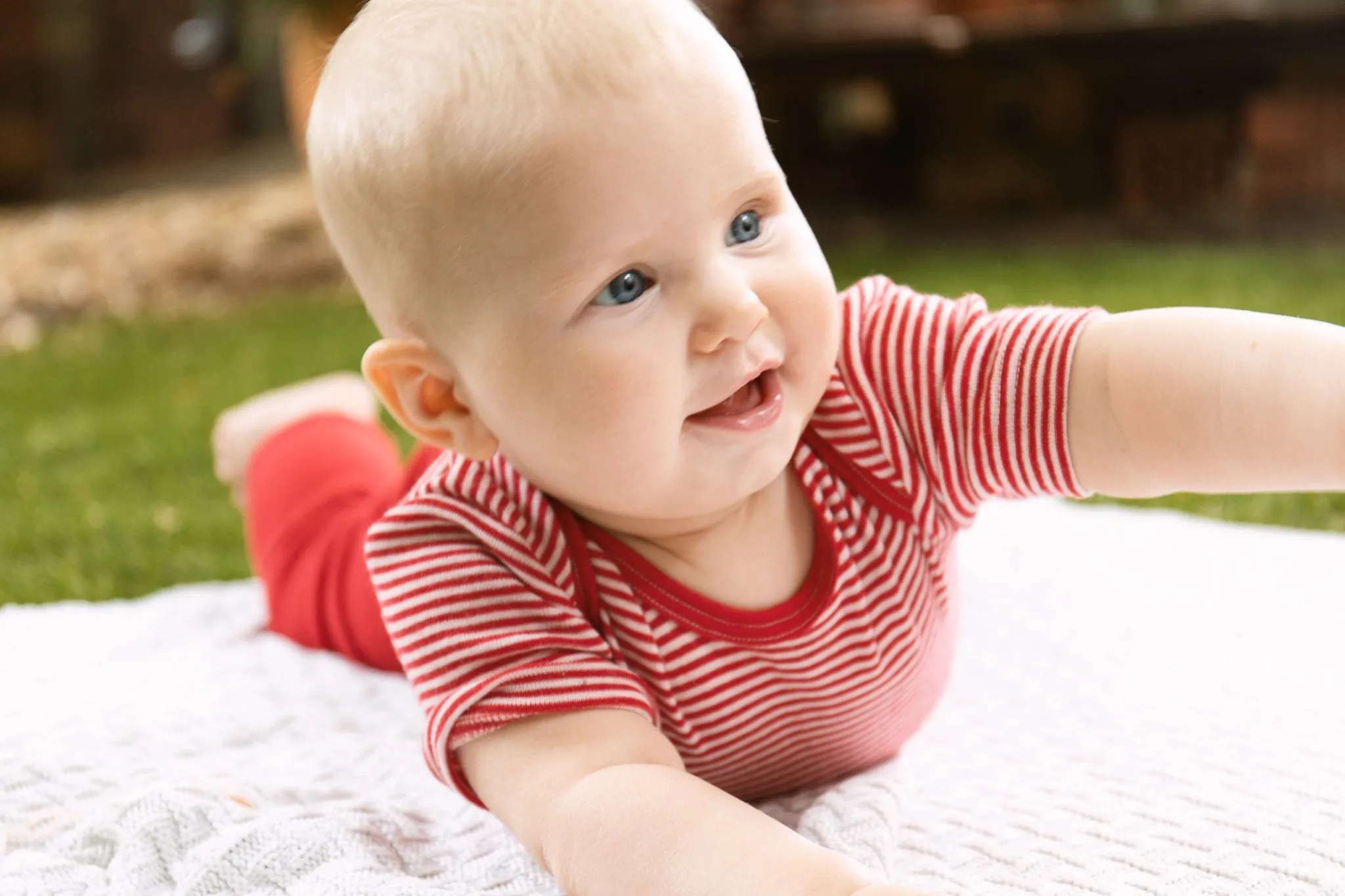 organic merino wool and silk short-sleeved onesie in red/natural stripe - baby/toddler